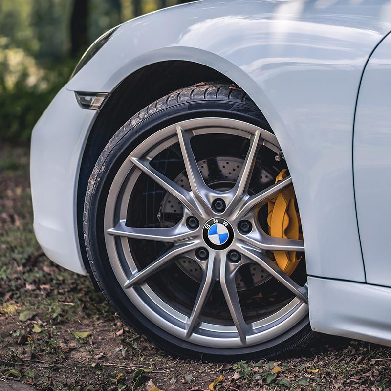 For BMW M 4Pc 65mm 56mm Wheel Center Caps Emblem Badge 50th Anniversary For BMW E39 E46 E90 E60 E87 E53 F10 F20 F30 M X3 X5 X6 Accessories
