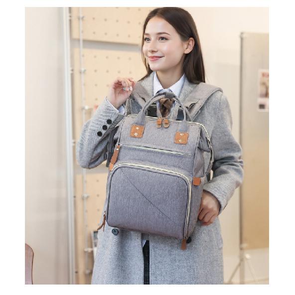 Large-capacity mommy bag, multifunctional and portable, designed for easy storage and carrying, a lightweight backpack for moms, with multiple
