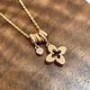 Exquisite Zirconia Flower Pendant Necklace with Round Ring and Sweater Chain - Light Luxury Petal Collarbone Accessory.