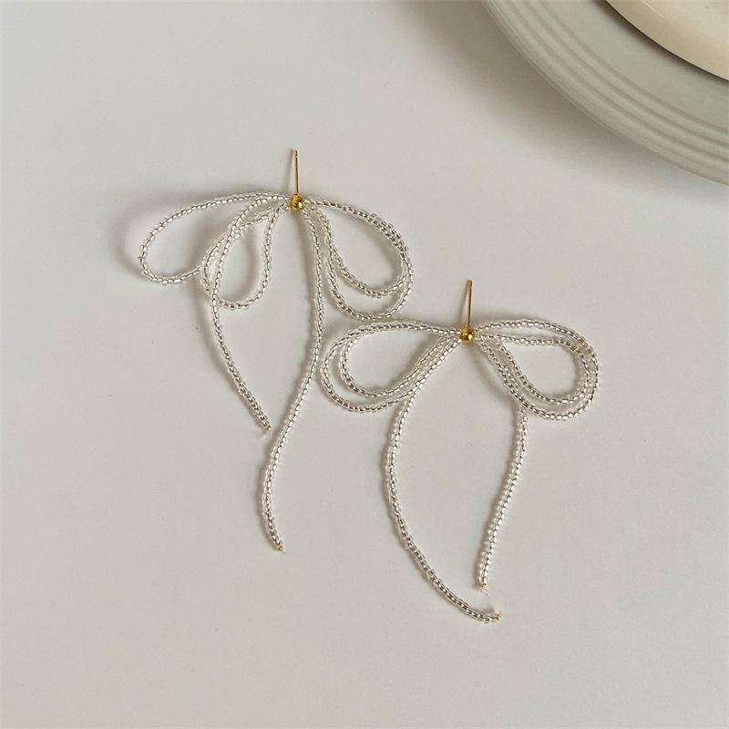Gentle Temperament Beaded Bow Tassel Earrings - 925 Silver, Niche Design, Light Luxury, 2026 New Style