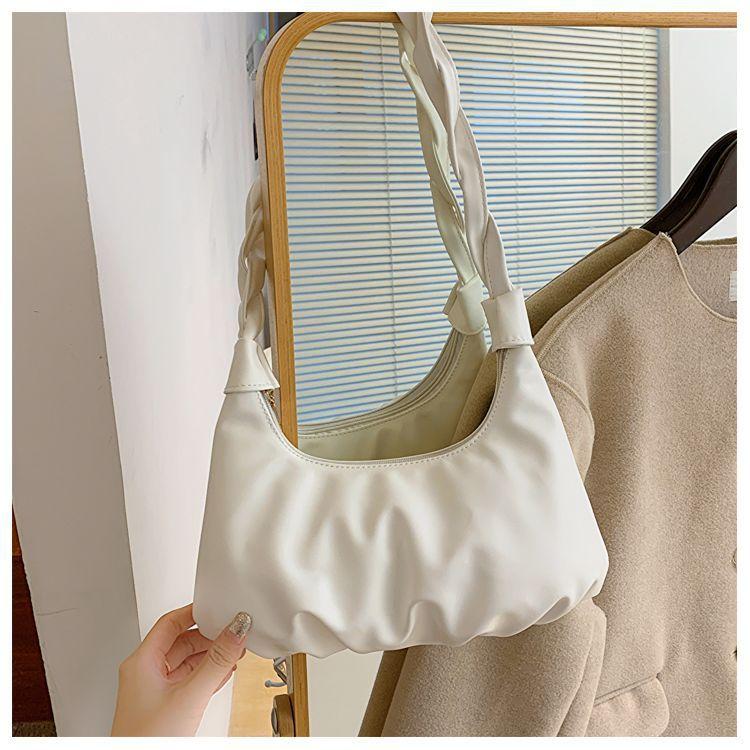 

Underarm bag women s large capacity 2025 new autumn niche feeling portable one-shoulder pleated dumpling bag бежевый