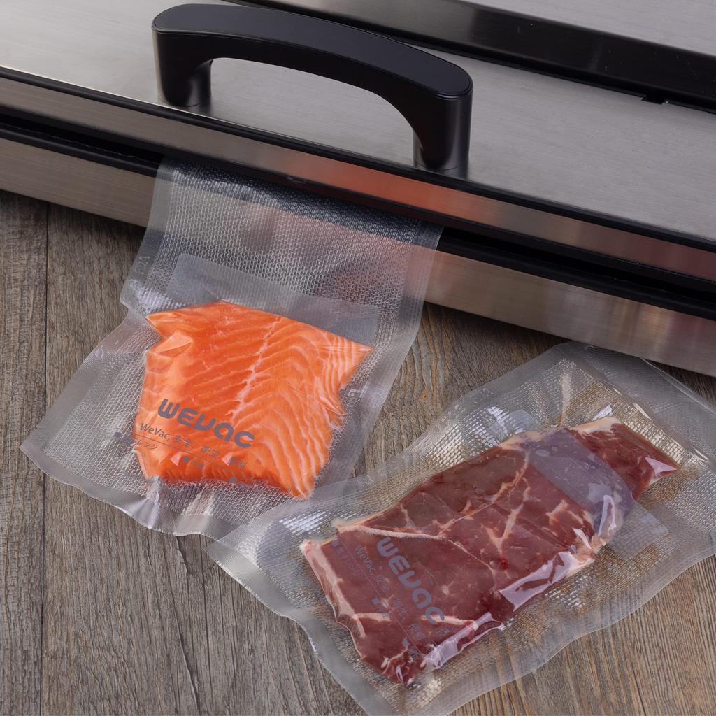 Wevac Vacuum Sealing Bags, 15x25cm and 20x30cm, 100 bags each. Pre-cut, embossed, easy to remove air, airtight seal. Ideal for vegetables, rice, fish,