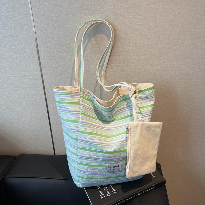 Korean version of casual large-capacity underarm bag women's 2025 new striped canvas bag double-sided back shoulder bucket bag