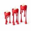 A Modern Candlestick In the Form of "flowing Wax" In Red.