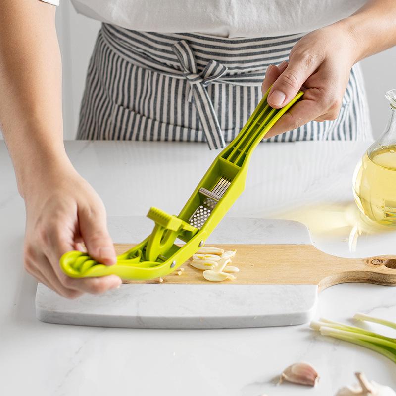 Versatile 2-in-1 Garlic Press, Slicer & Mincer – Essential Kitchen Chopper