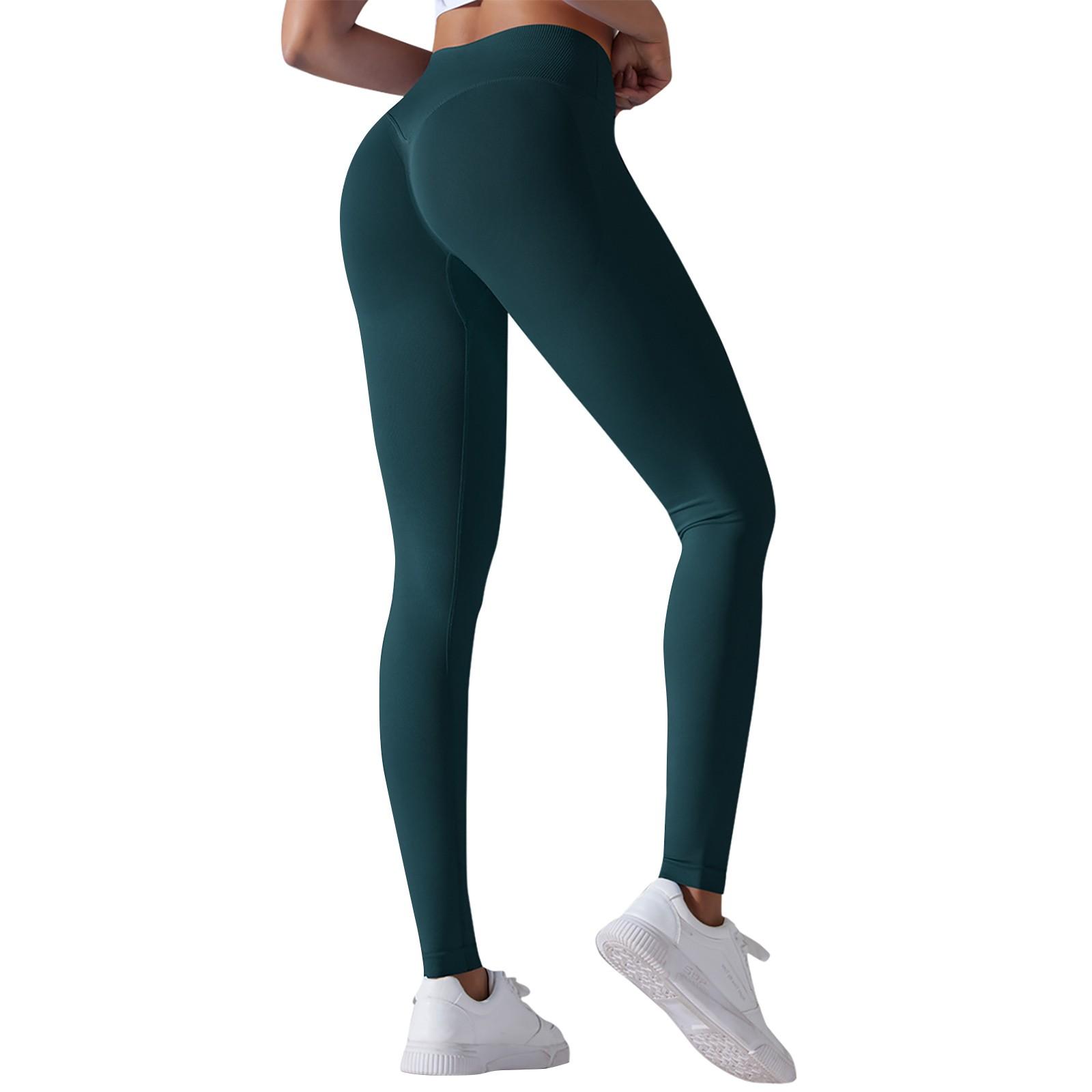 

Безшовні трикотажні дихаючі одноколірні штани для йоги з перехресною талією персикового кольору на стегнах. S Темно-синій