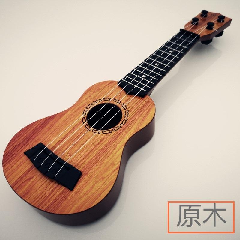 Bērnu simulācijas ukulele ģitāra mūzikas izglītībai un apgaismībai.