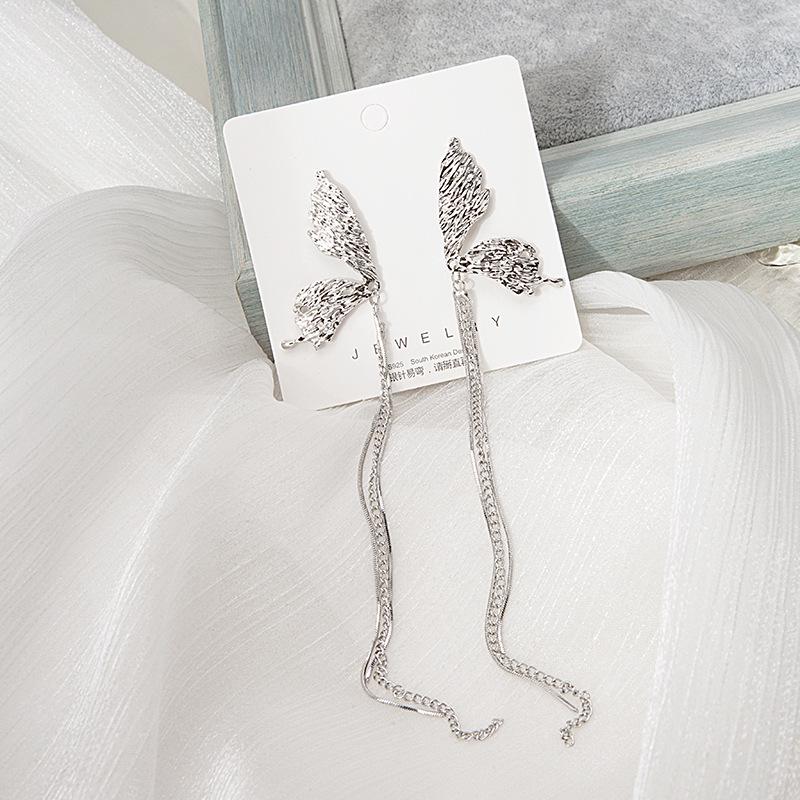 Silver Needle Asymmetrical Butterfly Tassel Earrings with Concave-Convex Texture and Long Stud Design