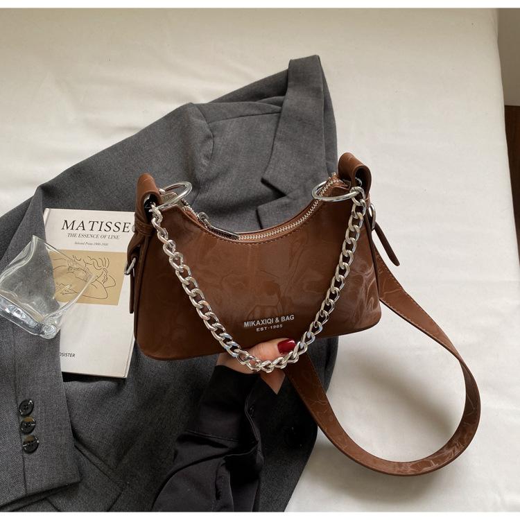 

Retro niche texture chain crescent moon bag women s 2025 new high-end super fire messenger bag casual shoulder bag темно-коричневого