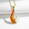 Shrimp Tail Shaped Pendant Necklace with Enamel Finish and Gold Tone Metal Chain Suitable for Casual and Everyday Wear Accessories