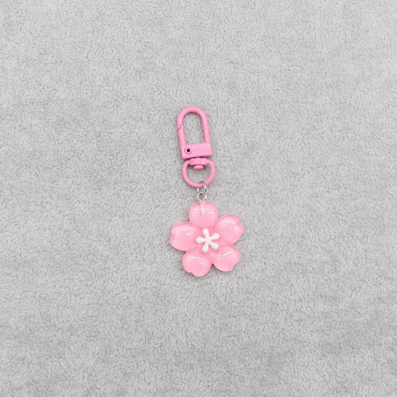 Romantic Sakura Keychain: Translucent Jelly Flower Pendant for Couples