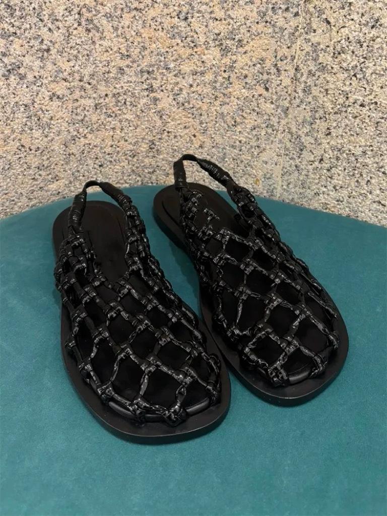 

Cowhide version~ niche fishing net woven hollow flat-bottomed Roman sandals women s 2025 new summer new cool slippers 40 чёрный