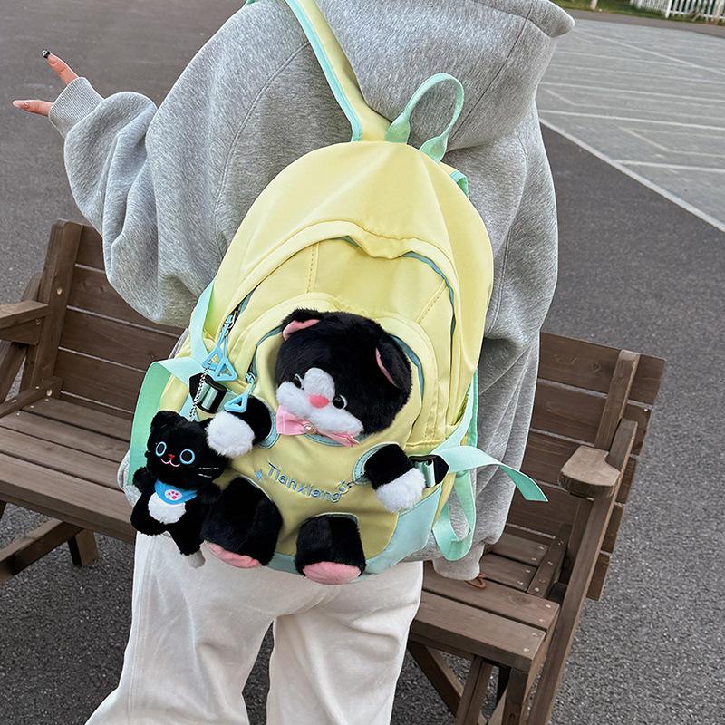 Schoolbag autumn new cute cat doll backpack female junior high school high school schoolbag large capacity campus style cute fun backpack