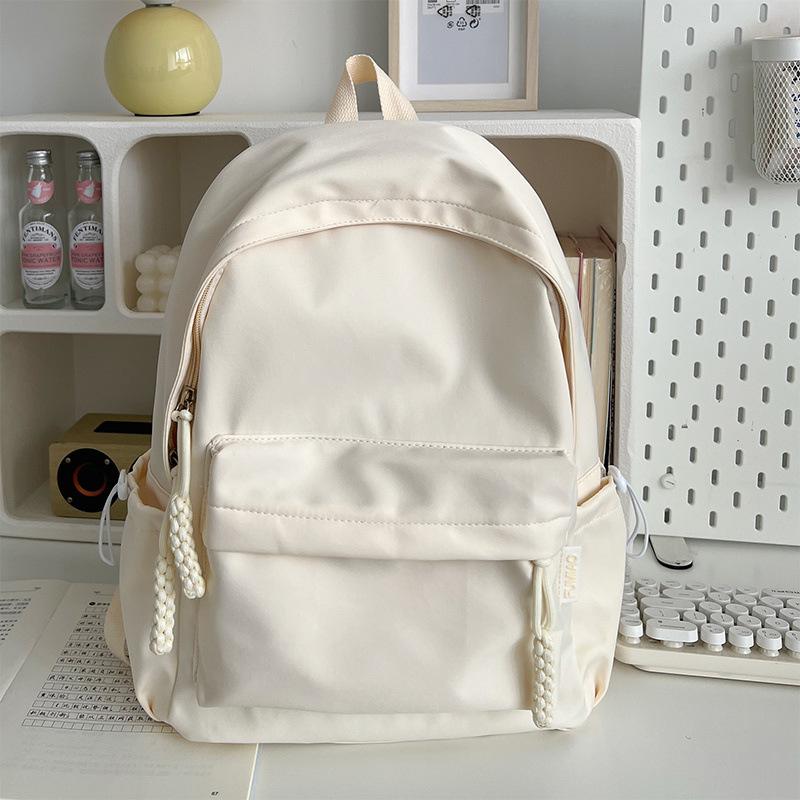 

Dopamine milk fufu high-value schoolbag female simple junior high school student small college student class backpack