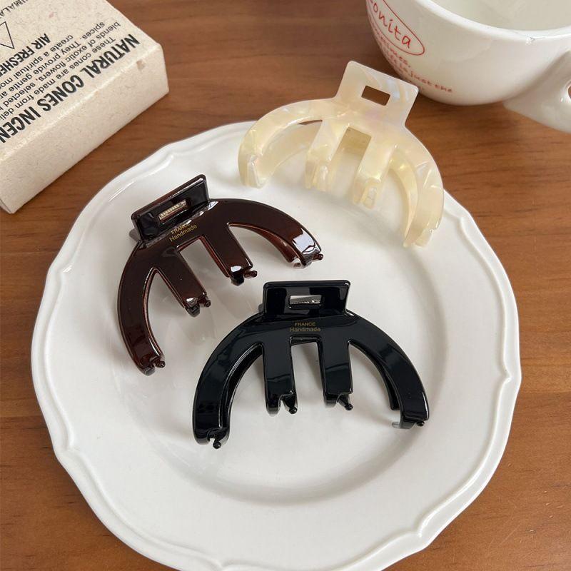 

1pc French hair clip with high-end feel, shark clip with curved hollow out, light luxury, black and white pattern hair grab