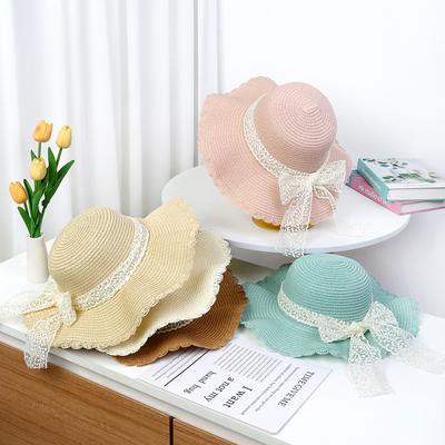 Women's Summer Korean Style Lace Bowknot Ribbon Paper Straw Woven Hat with Wavy Brim Round Top Fashion Sun Protection Hat
