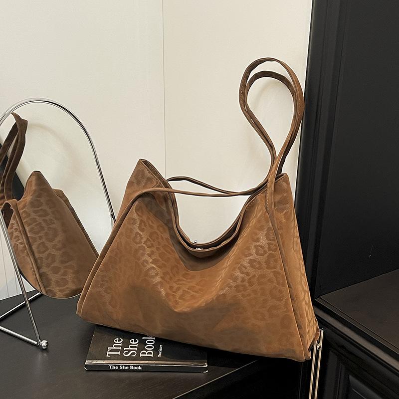 Herbst neue Retro Leopardenmuster Schulter Achseltasche modische Nische einfache Pendler tragbare Tragetasche