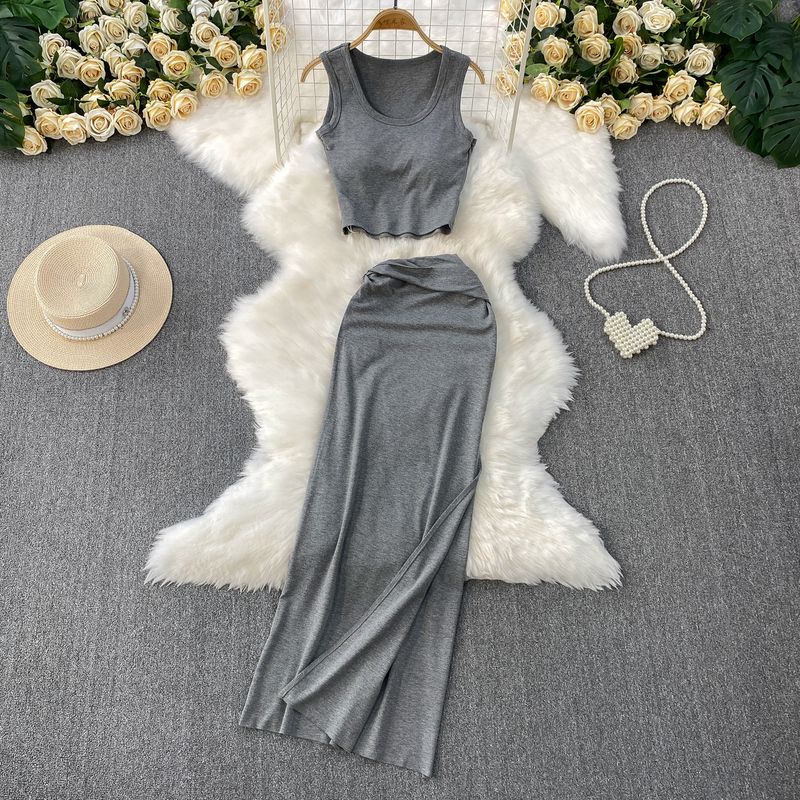 

Knitted U-Neck Sexy Short Sleeveless With Chest Pad Vest Top + High Waist Slimming Split Skirt Two-piece Suit Gray One size