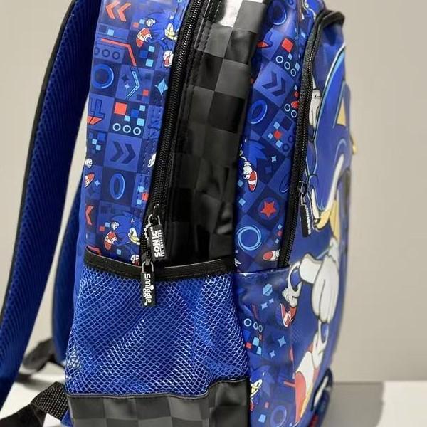 Smiggle Vysoce hodnotný dekompresní školní batoh pro žáky základních a středních škol - Velká kapacita, venkovní kreslený design