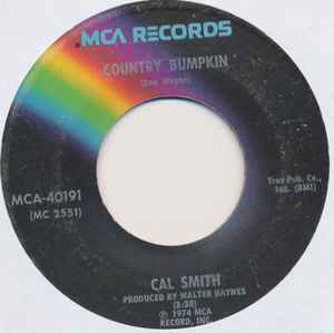 

7inch Record CAL SMITH - Country Bumpkin / It s Not The Mile MCA40191 MCA 1974 US Country/Folk Used