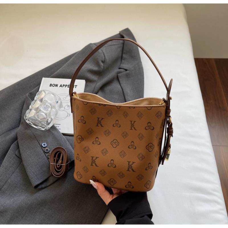 

Premium light luxury niche bag women s new trendy fashion hand carry shoulder bag commuter messenger bucket bag коричневый