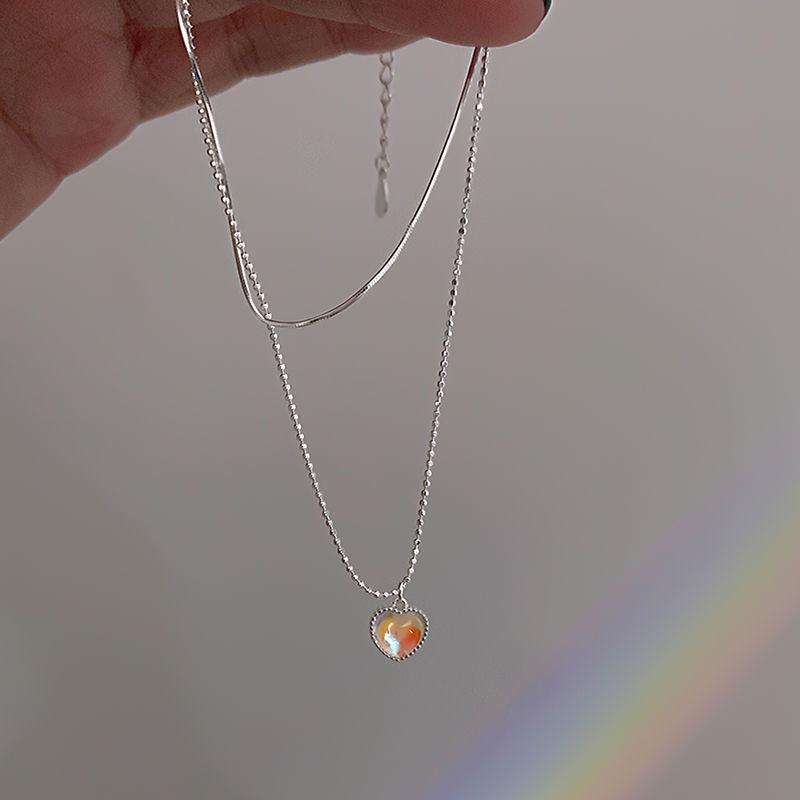 Elevate your summer style with the "Moonlight Dazzle Heart Pendant Necklace" - a chic Qixi gift perfect for your girlfriend.