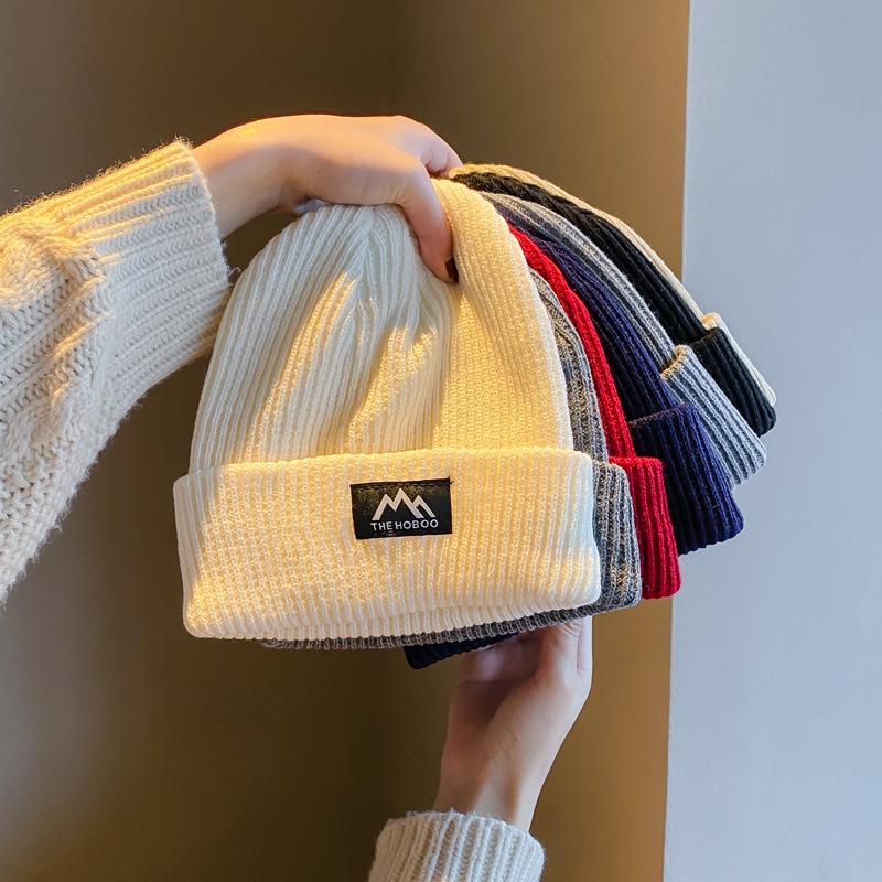 Japanese Trendy Woolen Hats: Unisex Knitted Beanies with Ear Protection for Autumn and Winter