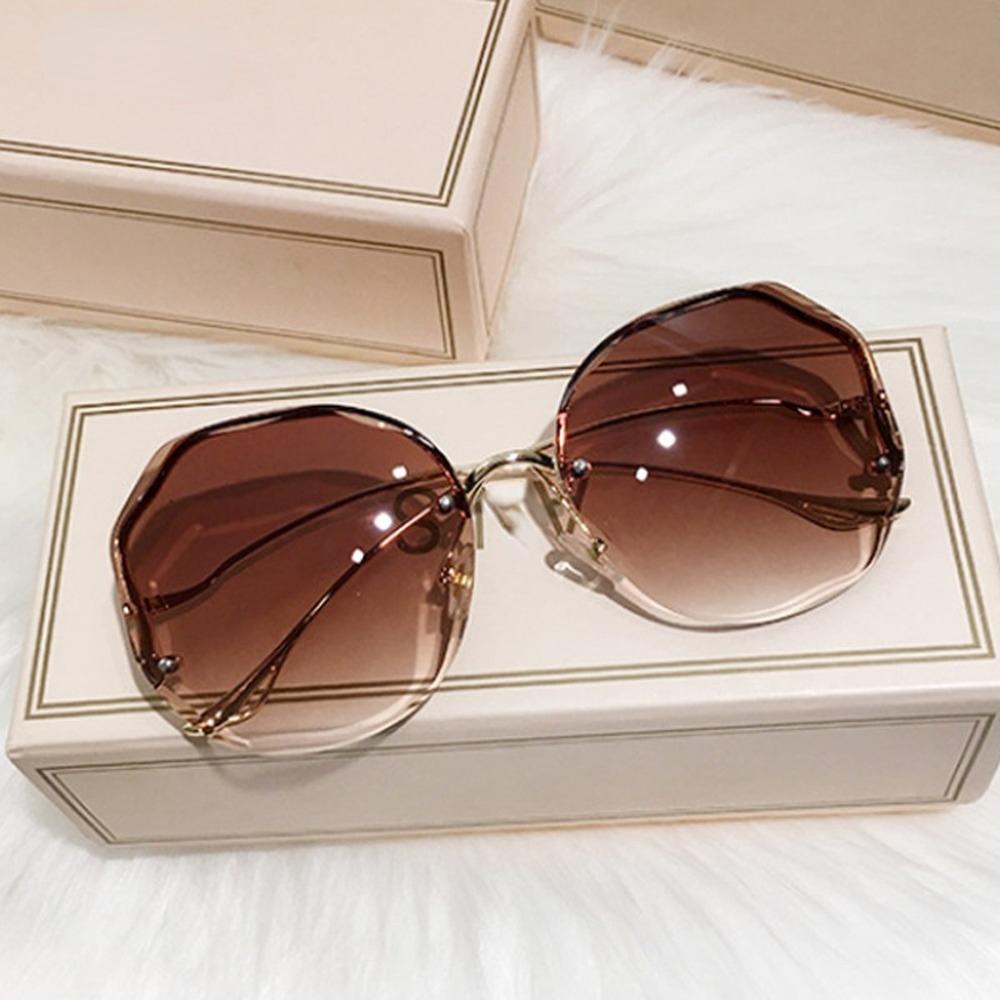 Luxe Ronde Gradiënt Zonnebril Vrouwen Metalen Gebogen Tempels Brillen Oceaan Randloze Mode Zonnebril Dames UV400