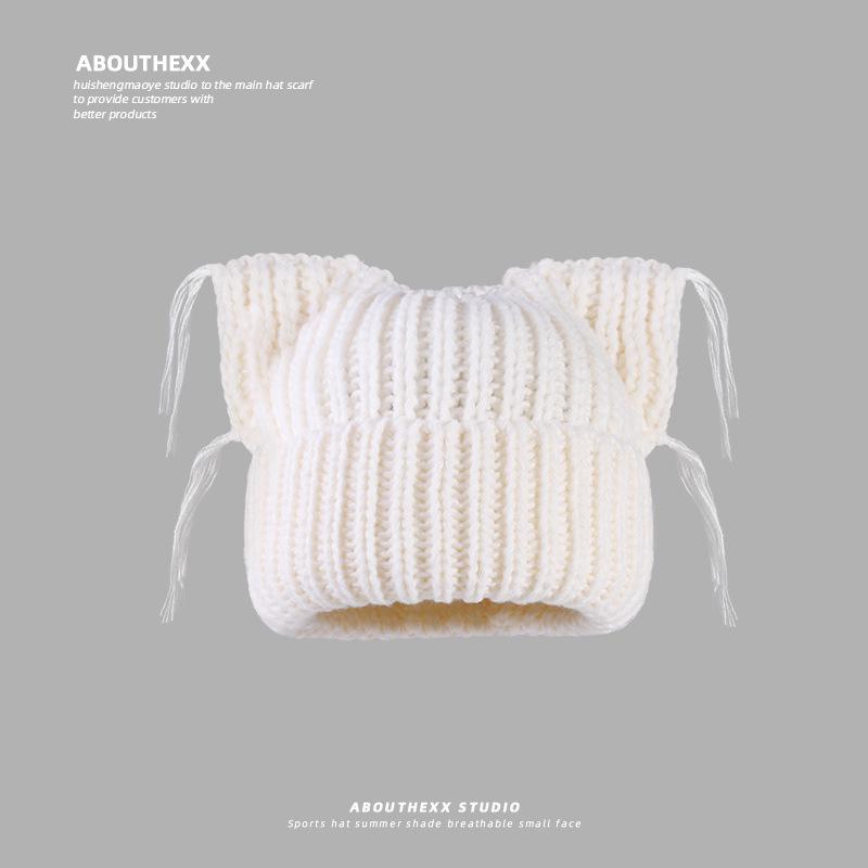 

Модний жіночий вовняний капелюх з китицями у вигляді котячих вушок - Товстий, теплий і модний в язаний капелюх для осені та зими. Medium (56-58 cm) молоко, білий колір