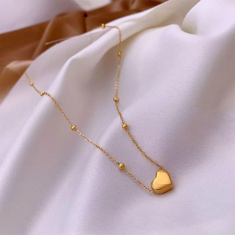 High-End Titanium Steel Colorfast Heart Necklace - Women's Versatile Clavicle Chain with Peach Heart Pendant