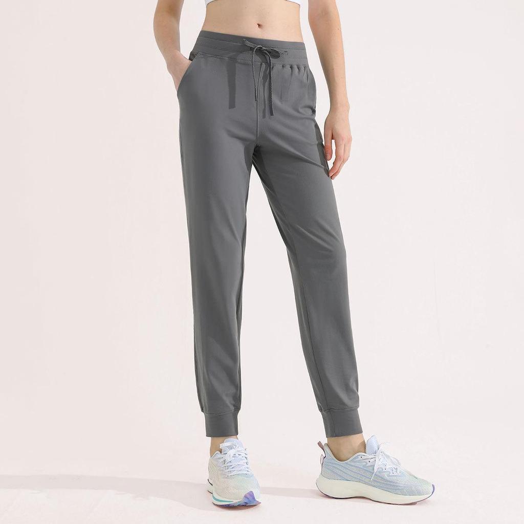 Women's Green Drawstring Quick-Dry Sports Pants: Lightweight, High-End, Straight-Leg Design for Summer.