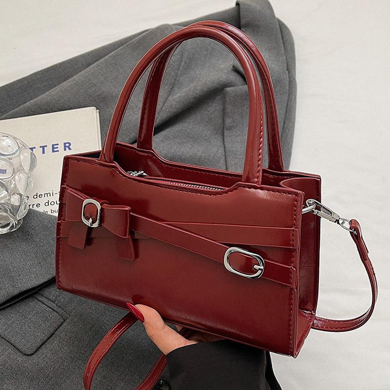 

New products are hot, high-quality foreign-style bows, portable small square bags, casual and versatile Korean version of fashionable messenger women