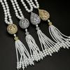 Elegant European & American Light Luxury Tassel Pearl Sweater Chain with 3D Hollow Zircon Pendant