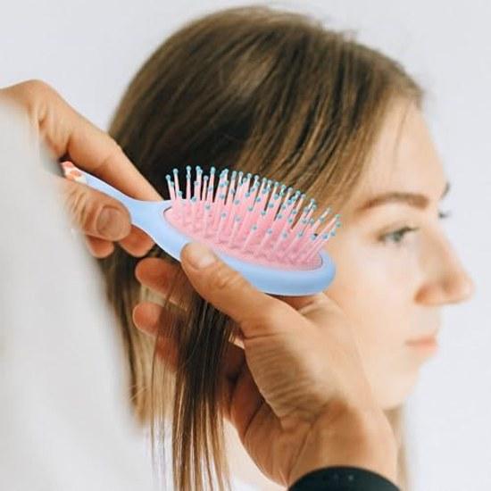 small hairbrush girls shape cats paw made from blue ABS material. It features excellent detangling capabilities durability making ideal caring dry