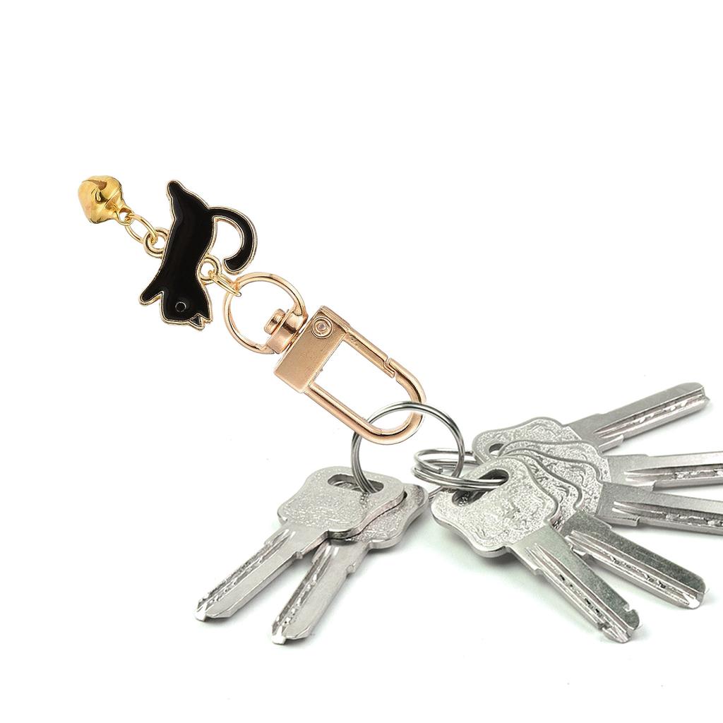 2 Stück Metall Schlüsselanhänger Set Modischer Paar Schlüsselanhänger Tropföl Schlüsselanhänger Praktisch und Unisex Katze und Fischgräte Schlüsselanhänger