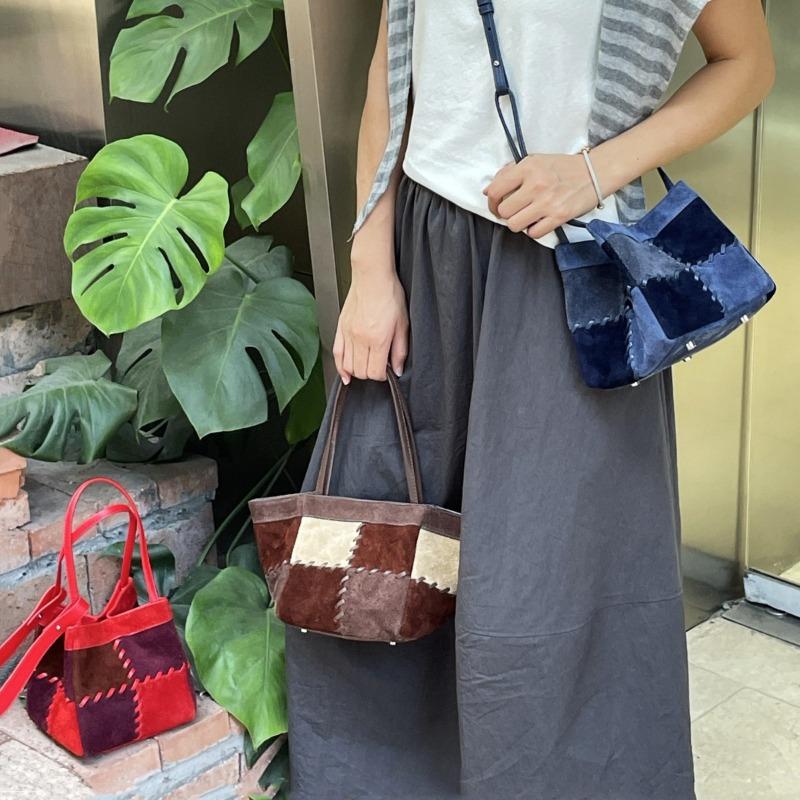 Frosted cowhide vegetable basket bag women's new sense fashionable exquisite small bag suede messenger bucket bag