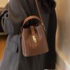 Fashion hand carrying bucket bag women's autumn and winter new niche simple casual woven shoulder messenger bag