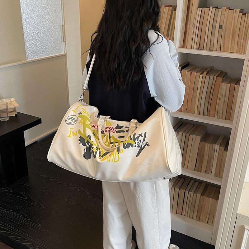 Duffel Bag mit Graffiti-Print, Griff und Schultergurt, Stilvolle Sport- und Reisetasche