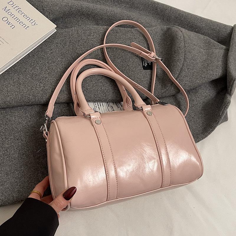 

Новая популярная корейская портативная сумка-подушка из высококачественной масляной вощеной кожи, универсальная нишевая темпераментная женская сумка-мессенджер в зарубежном стиле