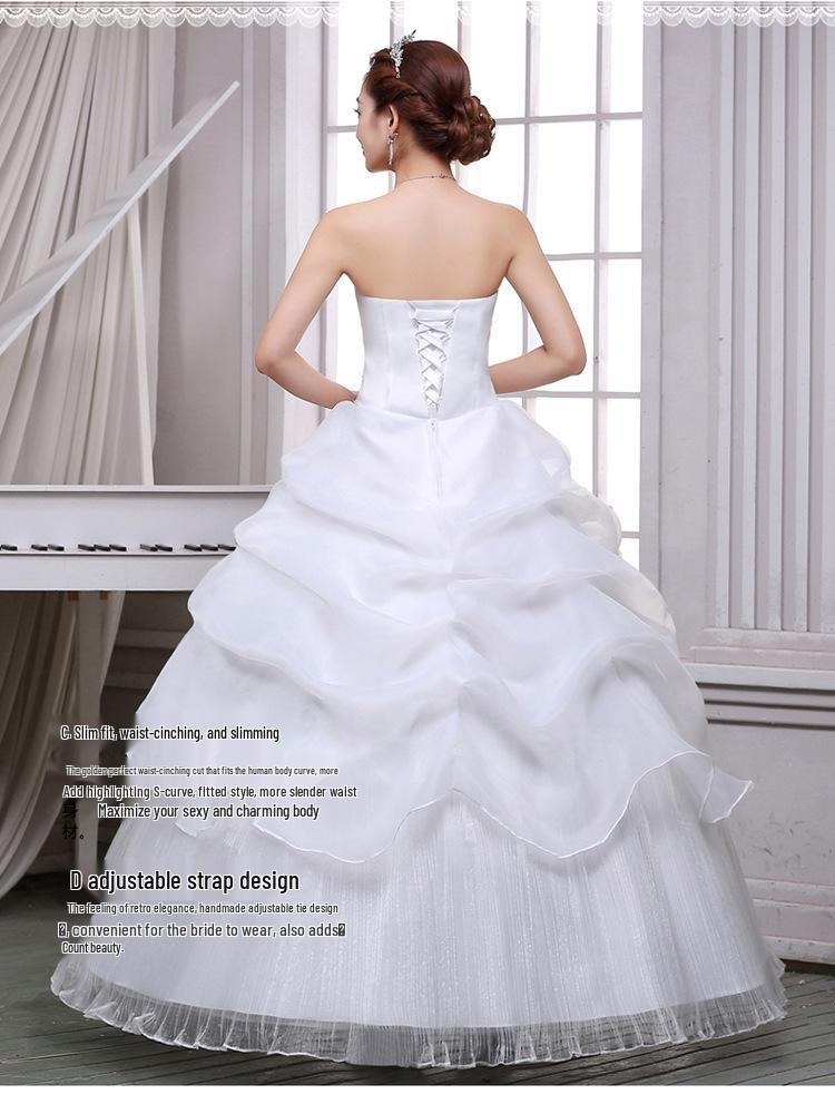 2025 Bílé šněrovací šaty bez ramínek v korejském stylu, délka až na zem, organzové svatební šaty