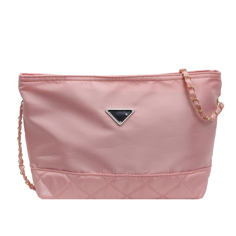 

2024 summer new fashion splicing bucket bag simple texture literary style large capacity commuting shoulder oblique span bag рожевий