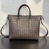 2026 new leather women's bag handwoven men's and women's same briefcase fashionable retro shoulder handbag cross-border