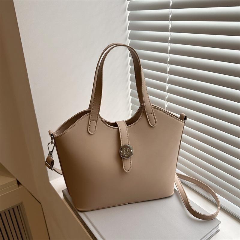 Geantă de mână cu design de nișă, temperament nou, versatilă, culoare solidă, geantă bucket de umăr, geantă messenger urbană pentru navetă, femei