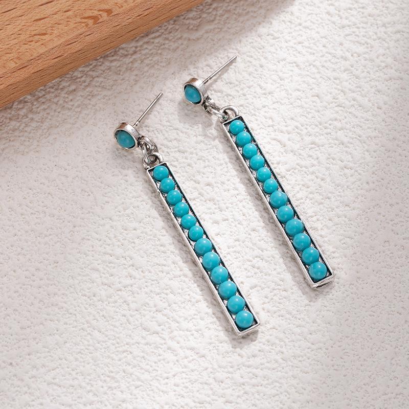 Retro Long Exaggerated Earrings, High-End Alloy Gold Inlaid White Turquoise Earrings, Niche Heavy Industry Earrings.