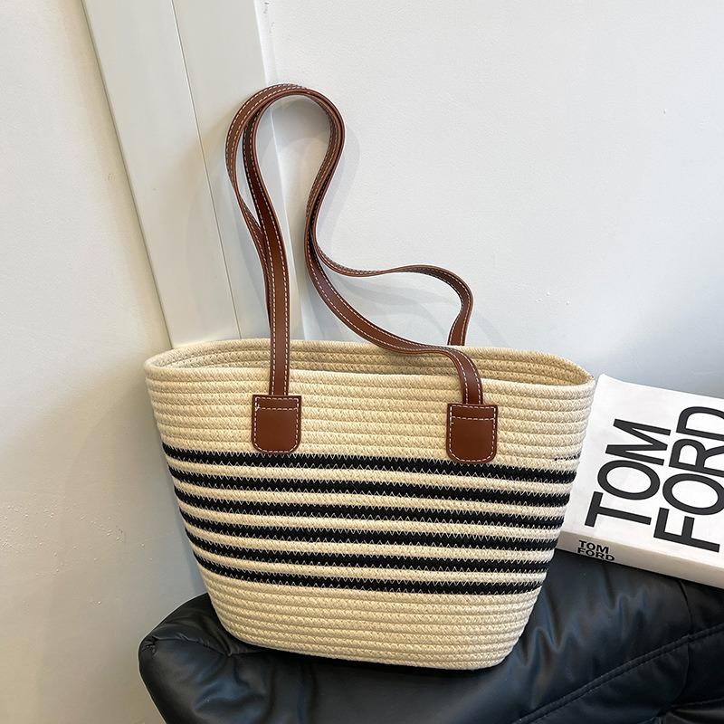 Gewebte Strohtasche Damen große Kapazität neue Sommer vielseitige Umhängetasche texturiert Pendler Strandtasche