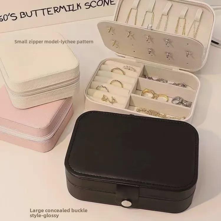 Exquisite Portable Jewelry Box: Compact Travel Storage for Earrings, Rings, and Necklaces.