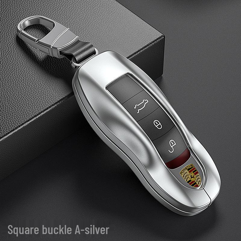 

Cayenne 911 Panamera Key Case: Aluminum Alloy Shell with Leather Rope.