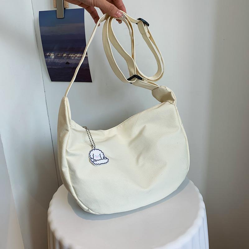 

Japanese 2026 Vintage Chic Girls Solid Color Soft Girls Single Shoulder Bag Korean Version Chaoins Simple Cross-body Dumplings Bag 35x8x20 белый