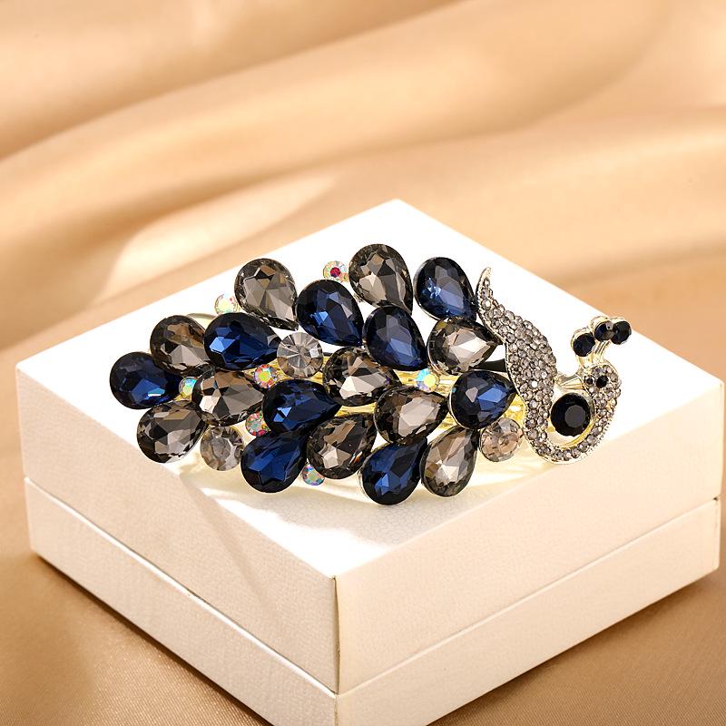 

Large Crystal Rhinestone Peacock Hairpin for Women - Spring Clip for Bun and Half Up Hairstyles шампанского