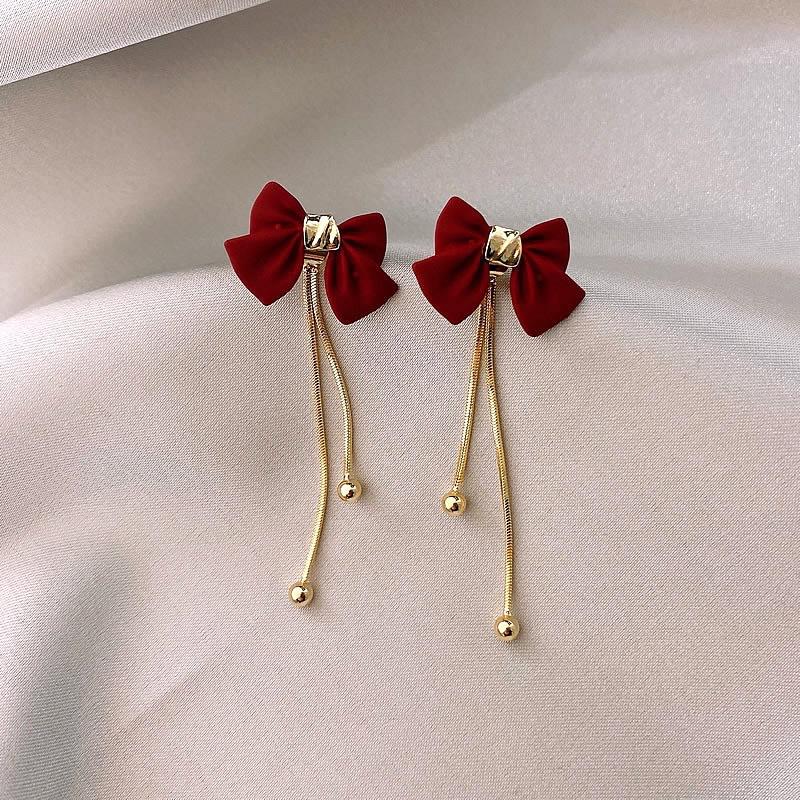 

2023 New Fashion Trend Unique Design Elegant Delicate Light Luxury Bow Knot Tassel Earrings Women High Zircon Party Gifts